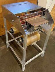 Folienverpackungsgerät mit Heißsiegelplatte